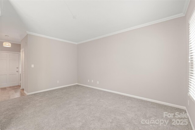 5949 Quail Hollow Rd Unit E, Charlotte, NC 28210 - unfurnished room with light carpet, baseboards, and crown molding