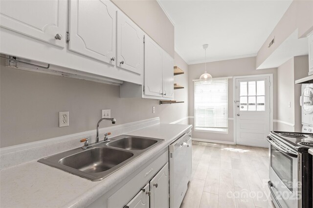 5949 Quail Hollow Rd Unit E, Charlotte, NC 28210 - kitchen featuring a sink, white dishwasher, stainless steel electric range oven, white cabinetry, and ornamental molding