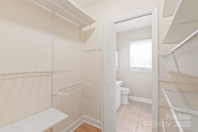5949 Quail Hollow Rd Unit E, Charlotte, NC 28210 - walk in closet with light tile patterned floors