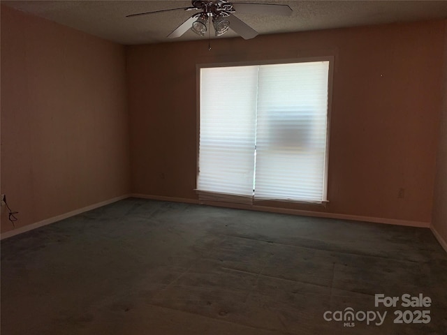5727 Dockside Dr, Charlotte, NC 28227 - empty room featuring carpet, a ceiling fan, baseboards, and a textured ceiling