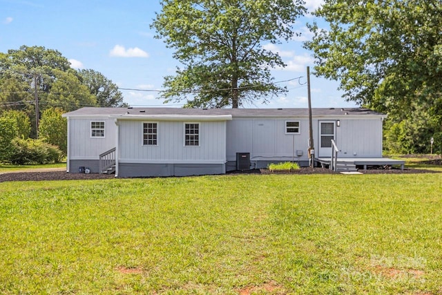 5354 Sherrills Ford Rd, Catawba, NC 28609 - rear view of house featuring entry steps, a lawn, and cooling unit