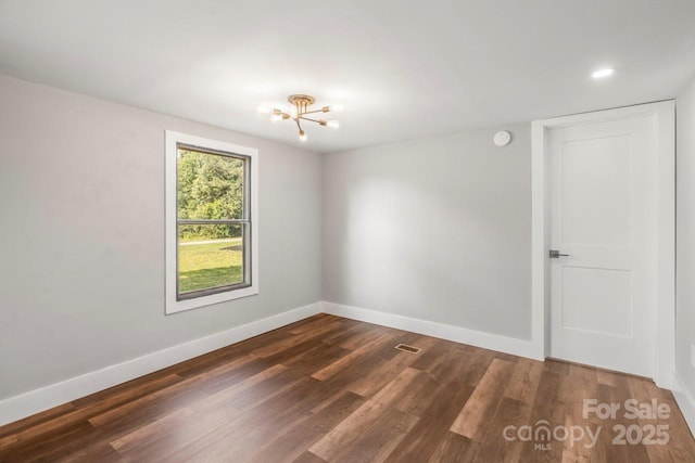 5354 Sherrills Ford Rd, Catawba, NC 28609 - empty room with wood finished floors, a chandelier, baseboards, a smoke detector, and recessed lighting