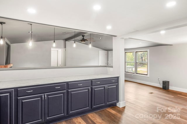 5354 Sherrills Ford Rd, Catawba, NC 28609 - kitchen with dark wood-style floors, baseboards, ceiling fan, decorative light fixtures, and light stone counters