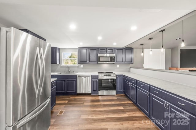 5354 Sherrills Ford Rd, Catawba, NC 28609 - kitchen featuring stainless steel appliances, a sink, dark wood-type flooring, hanging light fixtures, and recessed lighting