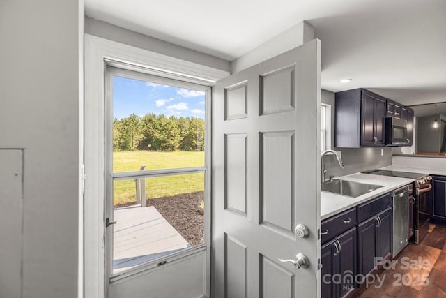 5354 Sherrills Ford Rd, Catawba, NC 28609 - kitchen with stainless steel appliances, a sink, plenty of natural light, and light countertops