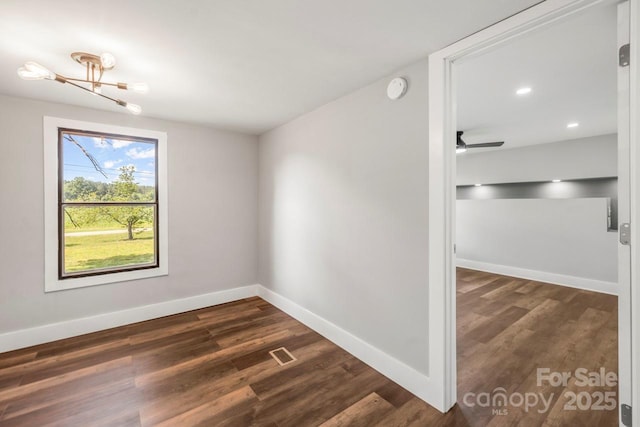 5354 Sherrills Ford Rd, Catawba, NC 28609 - unfurnished room with dark wood-style flooring, baseboards, a smoke detector, recessed lighting, and a chandelier