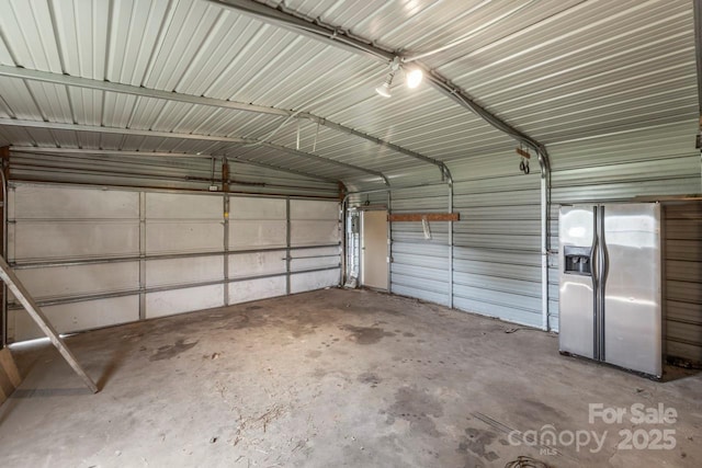 5354 Sherrills Ford Rd, Catawba, NC 28609 - garage featuring stainless steel fridge and metal wall