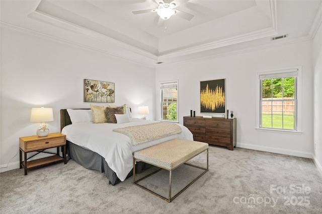 3831 Riceland Pl, Charlotte, NC 28216 - bedroom featuring a raised ceiling, crown molding, carpet floors, and a ceiling fan