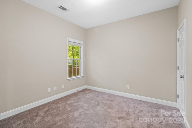3831 Riceland Pl, Charlotte, NC 28216 - carpeted empty room featuring baseboards