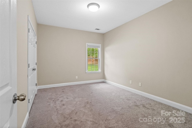 3831 Riceland Pl, Charlotte, NC 28216 - unfurnished room with carpet and baseboards