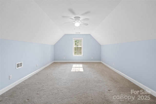 3831 Riceland Pl, Charlotte, NC 28216 - additional living space featuring a ceiling fan, lofted ceiling, and carpet floors