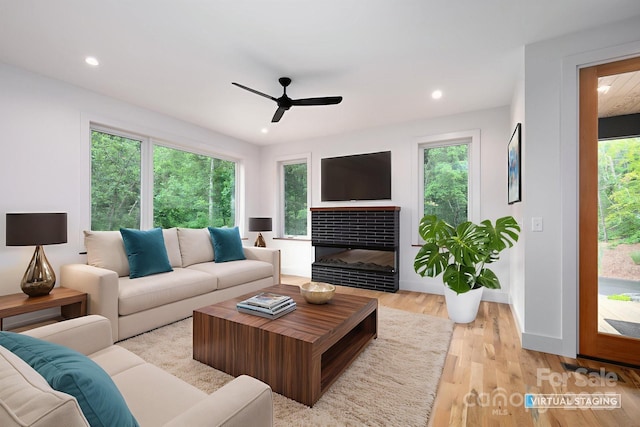 33 Windago Rd, Weaverville, NC 28787 - living area with ceiling fan, light wood-style floors, recessed lighting, baseboards, and a glass covered fireplace