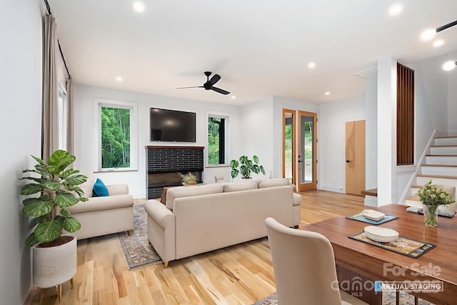 33 Windago Rd, Weaverville, NC 28787 - living room with healthy amount of natural light, light wood-style flooring, stairs, a ceiling fan, and recessed lighting