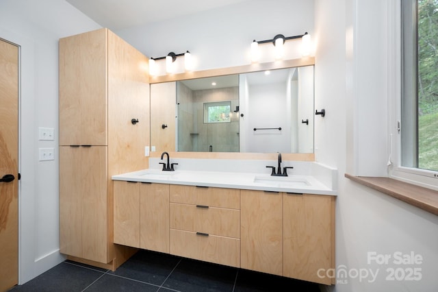 33 Windago Rd, Weaverville, NC 28787 - bathroom with double vanity, a shower stall, tile patterned floors, and plenty of natural light
