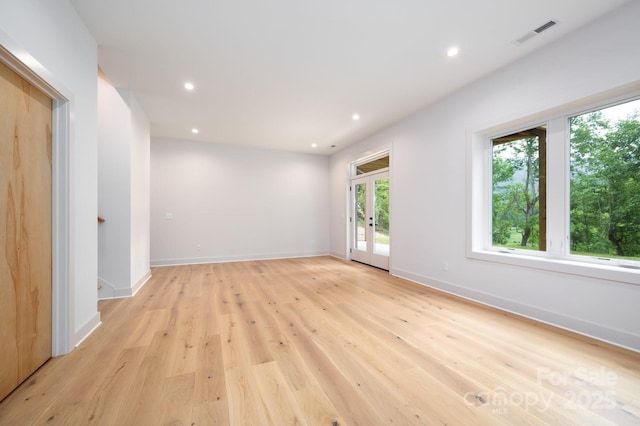 33 Windago Rd, Weaverville, NC 28787 - spare room featuring recessed lighting, light wood-style flooring, baseboards, and french doors