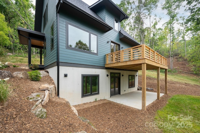 33 Windago Rd, Weaverville, NC 28787 - rear view of house with a patio, a wooden deck, and roof with shingles