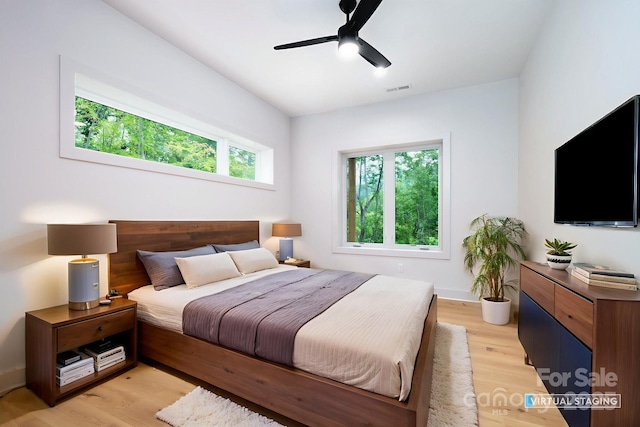 33 Windago Rd, Weaverville, NC 28787 - bedroom with light wood-style floors and ceiling fan