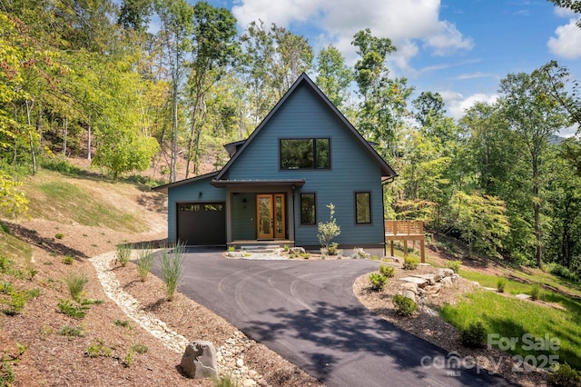 33 Windago Rd, Weaverville, NC 28787 - view of front of property with a garage and asphalt driveway