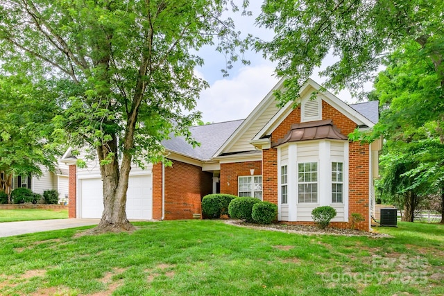 13402 Mccoy Rd, Huntersville, NC 28078 - view of front of property featuring a front yard, driveway, brick siding, an attached garage, and a shingled roof