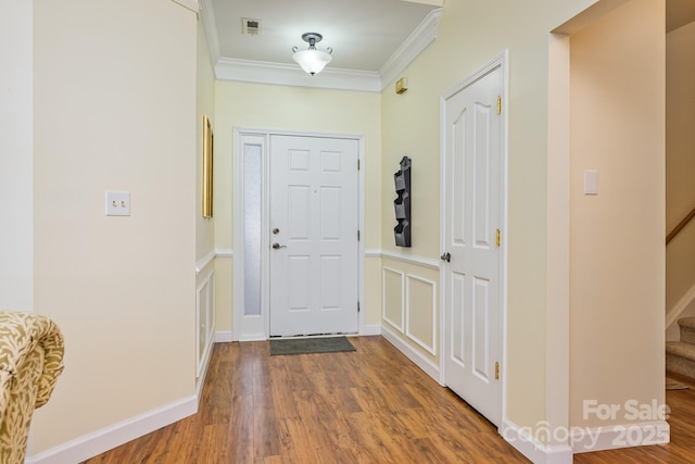 13402 Mccoy Rd, Huntersville, NC 28078 - foyer entrance featuring stairway, ornamental molding, and wood finished floors