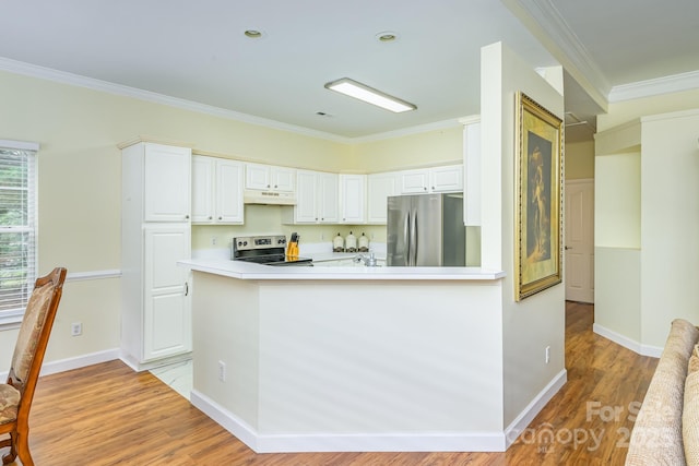 13402 Mccoy Rd, Huntersville, NC 28078 - kitchen with stainless steel appliances, crown molding, light wood-type flooring, white cabinetry, and under cabinet range hood