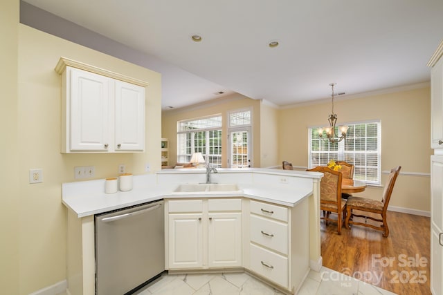 13402 Mccoy Rd, Huntersville, NC 28078 - kitchen with dishwasher, crown molding, a peninsula, a chandelier, and plenty of natural light