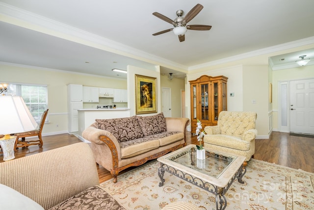 13402 Mccoy Rd, Huntersville, NC 28078 - living area featuring ornamental molding, ceiling fan, and wood finished floors