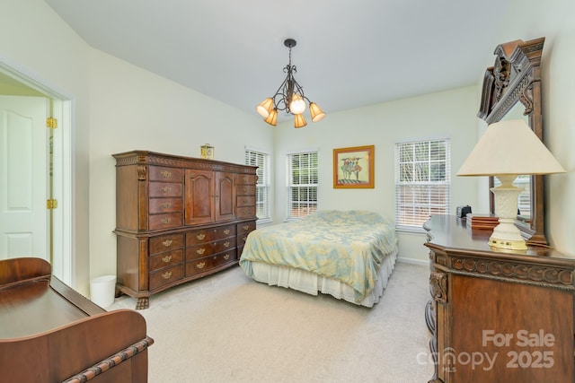 13402 Mccoy Rd, Huntersville, NC 28078 - bedroom featuring light colored carpet and a chandelier