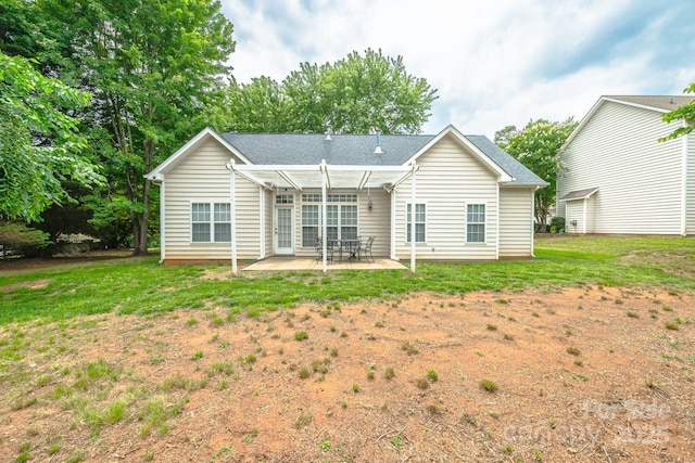13402 Mccoy Rd, Huntersville, NC 28078 - back of house featuring a patio and a lawn