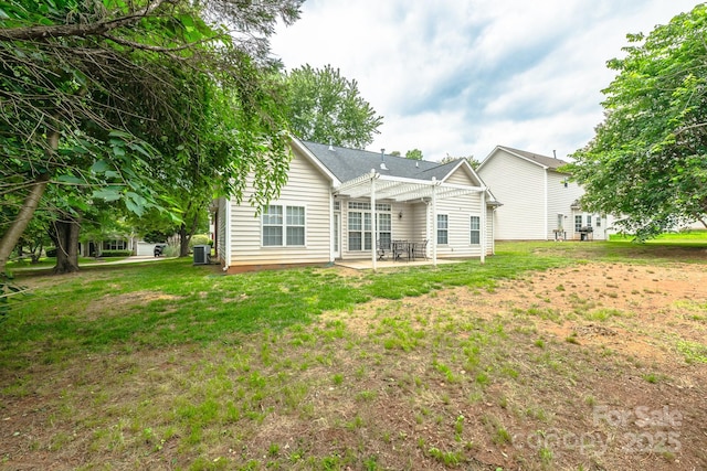 13402 Mccoy Rd, Huntersville, NC 28078 - back of property with a patio area and a lawn