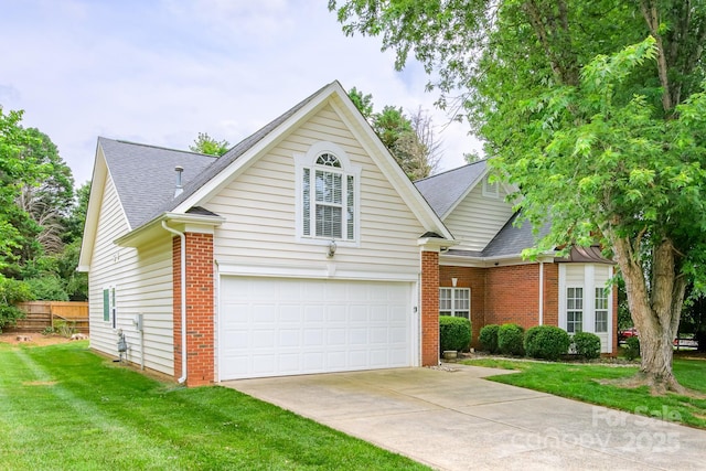13402 Mccoy Rd, Huntersville, NC 28078 - traditional-style house featuring brick siding, driveway, roof with shingles, and an attached garage