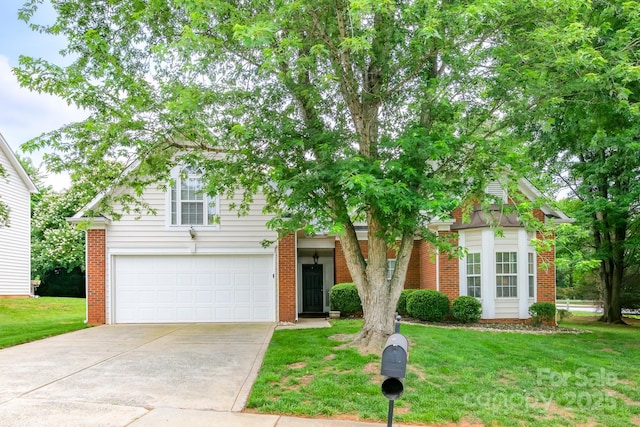 13402 Mccoy Rd, Huntersville, NC 28078 - view of property hidden behind natural elements featuring driveway, a front lawn, an attached garage, and brick siding