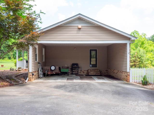 409 Ridge Rd, Clover, SC 29710 - back of property featuring an attached carport and driveway