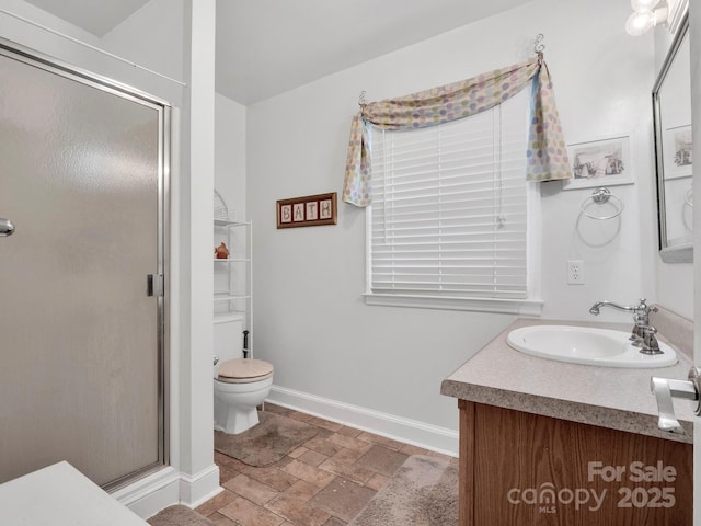409 Ridge Rd, Clover, SC 29710 - bathroom featuring vanity, stone tile flooring, toilet, and a shower stall