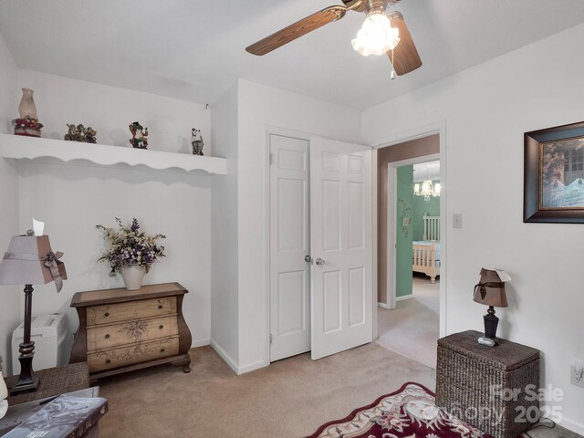 409 Ridge Rd, Clover, SC 29710 - living area with carpet flooring, a ceiling fan, and baseboards