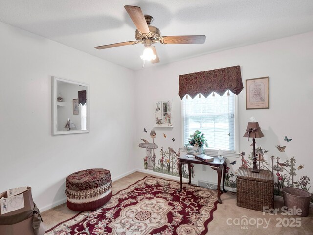 409 Ridge Rd, Clover, SC 29710 - home office with light carpet, a ceiling fan, and baseboards