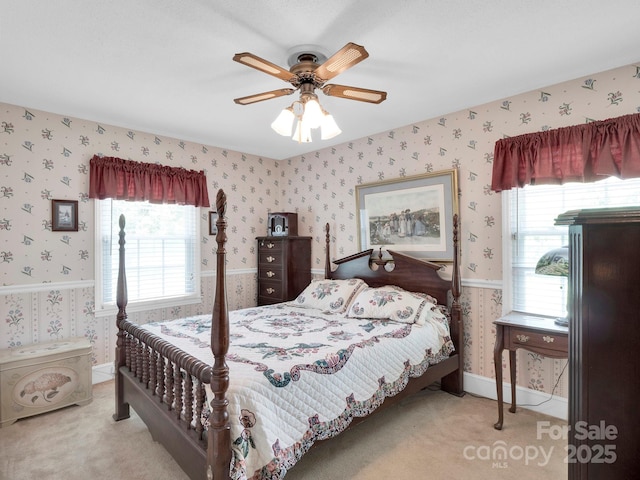 409 Ridge Rd, Clover, SC 29710 - carpeted bedroom featuring wallpapered walls, multiple windows, baseboards, and a ceiling fan