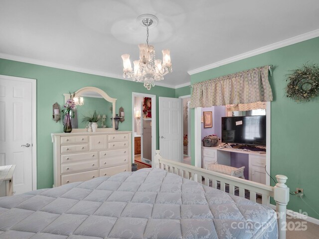 409 Ridge Rd, Clover, SC 29710 - carpeted bedroom with a chandelier, ornamental molding, and baseboards