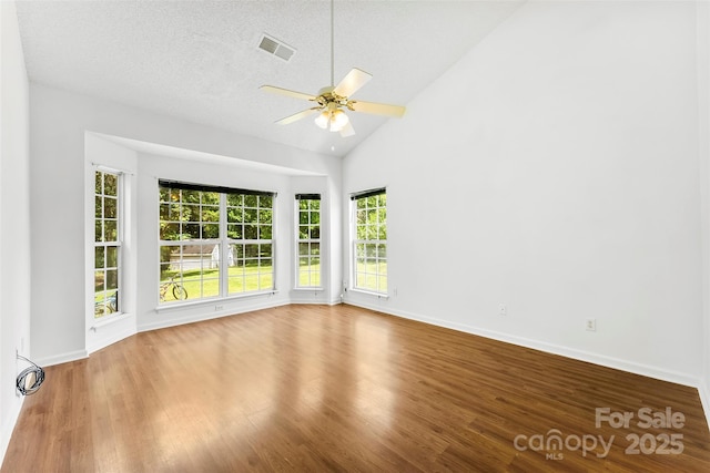 13832 Queenswater Ln, Charlotte, NC 28273 - unfurnished room featuring a ceiling fan, wood finished floors, baseboards, and high vaulted ceiling
