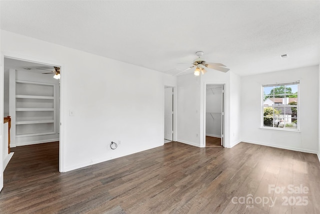 13832 Queenswater Ln, Charlotte, NC 28273 - unfurnished living room featuring ceiling fan, wood finished floors, baseboards, and built in features
