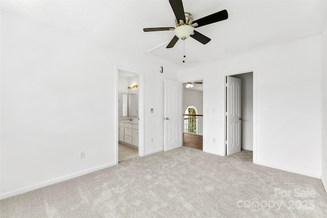 13832 Queenswater Ln, Charlotte, NC 28273 - unfurnished bedroom with attic access, light colored carpet, connected bathroom, baseboards, and ceiling fan