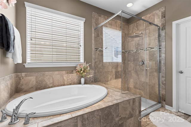 5059 Fenwick Ct, Lancaster, SC 29720 - bathroom featuring a garden tub, a shower stall, and recessed lighting