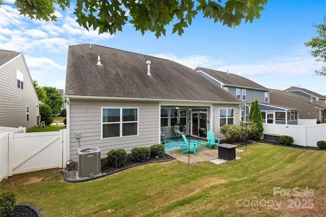 5059 Fenwick Ct, Lancaster, SC 29720 - back of property with a patio area, a fenced backyard, a shingled roof, and a gate