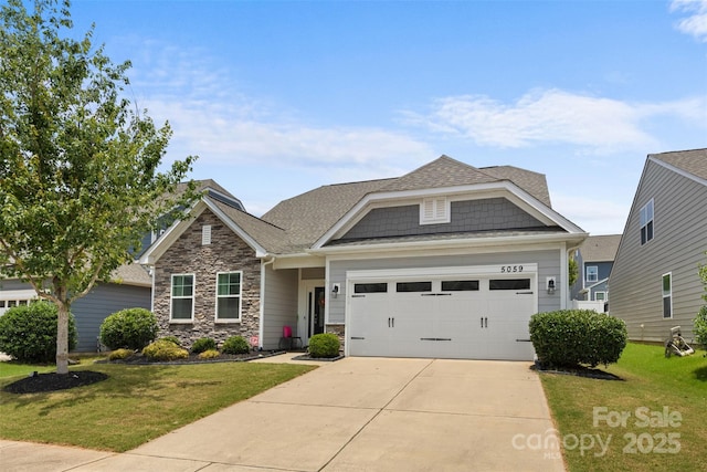 5059 Fenwick Ct, Lancaster, SC 29720 - craftsman-style home with a front yard, stone siding, driveway, and a garage