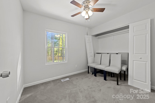4918 Tyne Dr, Durham, NC 27703 - living area with a ceiling fan, carpet, and baseboards