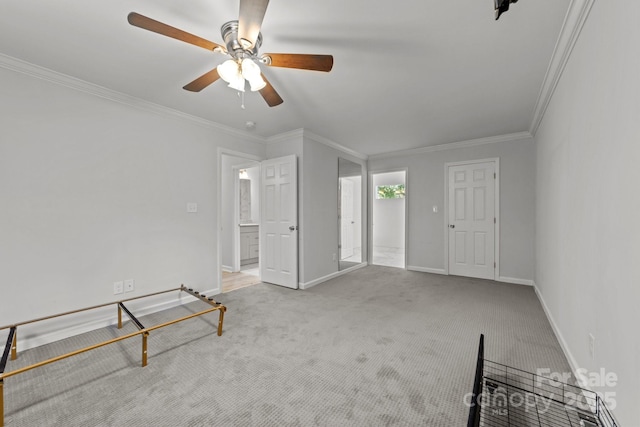 4918 Tyne Dr, Durham, NC 27703 - unfurnished bedroom with carpet flooring, crown molding, baseboards, and ceiling fan