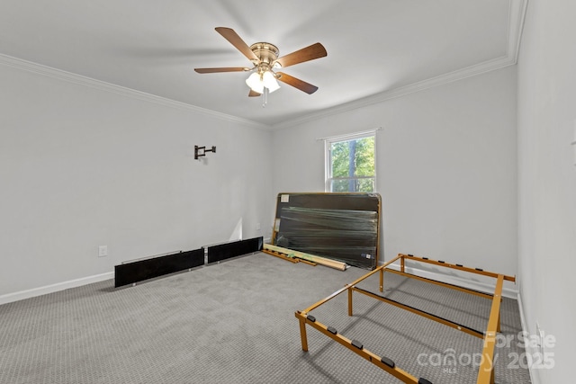 4918 Tyne Dr, Durham, NC 27703 - carpeted bedroom with ornamental molding, baseboards, and ceiling fan
