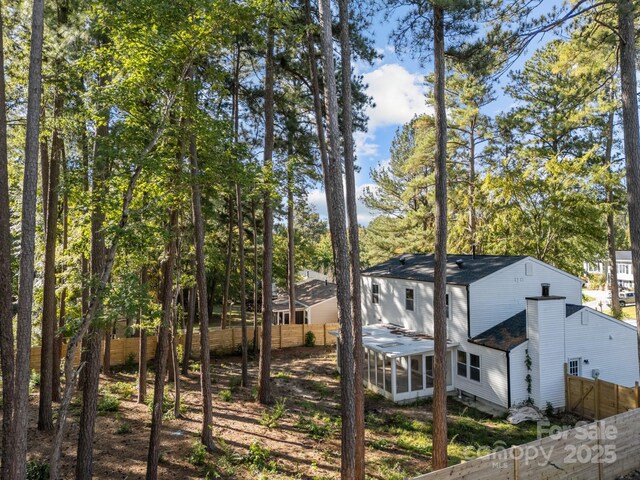 4918 Tyne Dr, Durham, NC 27703 - back of house featuring a sunroom
