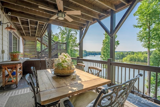 5888 Wood Duck Way, Catawba, NC 28609 - deck featuring stairs, outdoor dining space, a water view, and ceiling fan