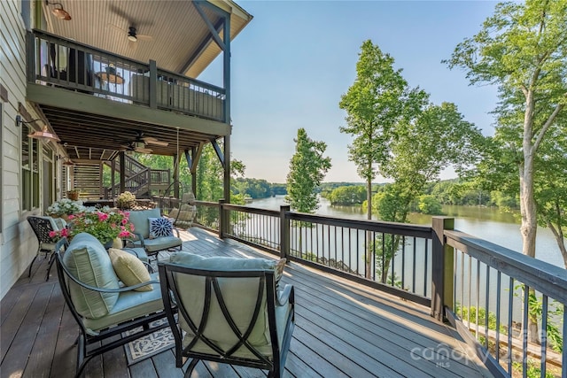 5888 Wood Duck Way, Catawba, NC 28609 - deck featuring stairs, a water view, a ceiling fan, and an outdoor living space